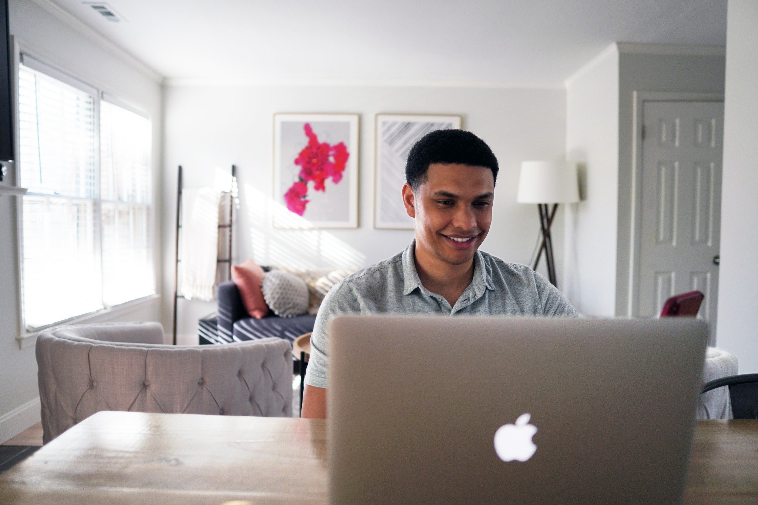 Image of a man in his laptop
